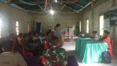 Babinsa Kecamatan Rindi Hadiri Rapat Forum Konsultasi Publik Pendataan Awal Regsosek