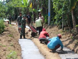 Meningkatkan Kesejahteraan Masyarakat, Kodim 1626/Bangli Bangun Infrastuktur Jalan Rabat Beton Di Desa Ulian